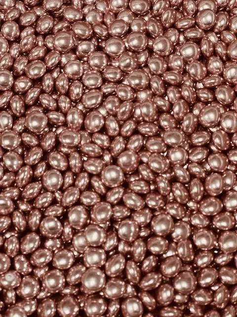 Dragée forme lentille au chocolat au lait cuivre, or et rose gold 250g